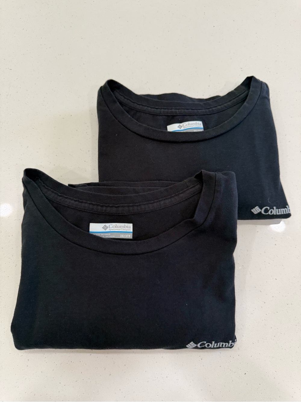 Columbia Black Tees with white Accent Label. Two (2) Tees